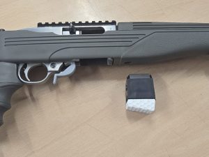 semi auto stainless ruger 10 22 with adjustable folding stock